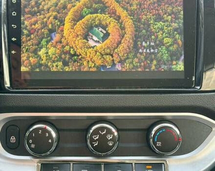 Білий Кіа Ріо, об'ємом двигуна 1.4 л та пробігом 65 тис. км за 12700 $, фото 30 на Automoto.ua