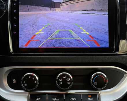 Білий Кіа Ріо, об'ємом двигуна 1.4 л та пробігом 65 тис. км за 12700 $, фото 29 на Automoto.ua