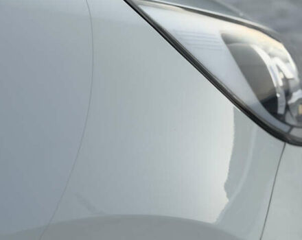 Білий Кіа Ріо, об'ємом двигуна 1.4 л та пробігом 65 тис. км за 12700 $, фото 10 на Automoto.ua