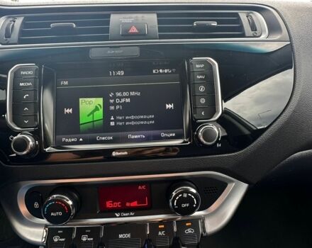 Білий Кіа Ріо, об'ємом двигуна 1.4 л та пробігом 117 тис. км за 12800 $, фото 9 на Automoto.ua