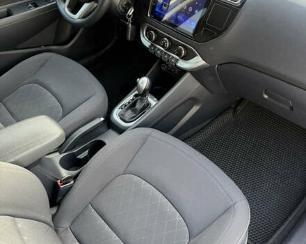 Білий Кіа Ріо, об'ємом двигуна 1.4 л та пробігом 65 тис. км за 12700 $, фото 23 на Automoto.ua