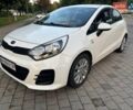 Білий Кіа Ріо, об'ємом двигуна 1.2 л та пробігом 124 тис. км за 8311 $, фото 1 на Automoto.ua