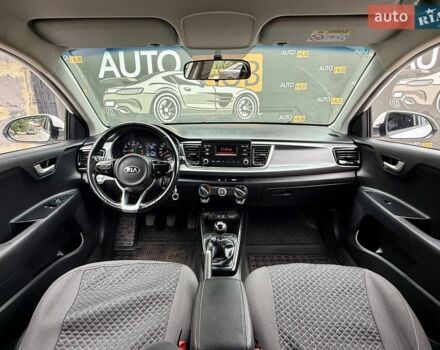 Білий Кіа Ріо, об'ємом двигуна 1.25 л та пробігом 69 тис. км за 9900 $, фото 11 на Automoto.ua