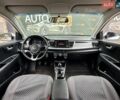 Білий Кіа Ріо, об'ємом двигуна 1.25 л та пробігом 69 тис. км за 9900 $, фото 11 на Automoto.ua