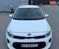 Білий Кіа Ріо, об'ємом двигуна 1.4 л та пробігом 89 тис. км за 13400 $, фото 14 на Automoto.ua