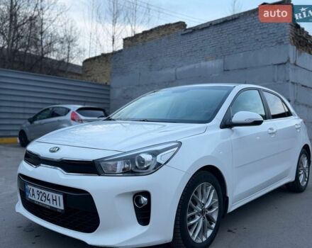 Білий Кіа Ріо, об'ємом двигуна 1.4 л та пробігом 89 тис. км за 13400 $, фото 12 на Automoto.ua