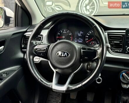 Білий Кіа Ріо, об'ємом двигуна 1.25 л та пробігом 69 тис. км за 9900 $, фото 12 на Automoto.ua