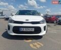 Білий Кіа Ріо, об'ємом двигуна 1.37 л та пробігом 90 тис. км за 12950 $, фото 6 на Automoto.ua