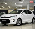 Білий Кіа Ріо, об'ємом двигуна 1.4 л та пробігом 65 тис. км за 12499 $, фото 1 на Automoto.ua