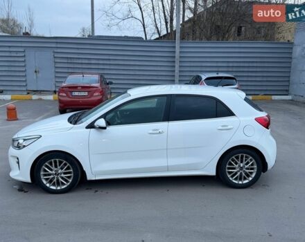 Білий Кіа Ріо, об'ємом двигуна 1.4 л та пробігом 89 тис. км за 13400 $, фото 9 на Automoto.ua