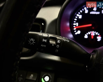 Білий Кіа Ріо, об'ємом двигуна 1.4 л та пробігом 65 тис. км за 12499 $, фото 22 на Automoto.ua