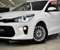Білий Кіа Ріо, об'ємом двигуна 1.4 л та пробігом 65 тис. км за 12499 $, фото 1 на Automoto.ua