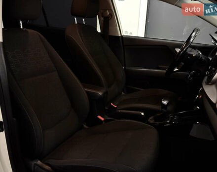 Білий Кіа Ріо, об'ємом двигуна 1.4 л та пробігом 65 тис. км за 12499 $, фото 14 на Automoto.ua