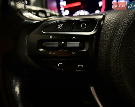 Білий Кіа Ріо, об'ємом двигуна 1.4 л та пробігом 65 тис. км за 12499 $, фото 23 на Automoto.ua