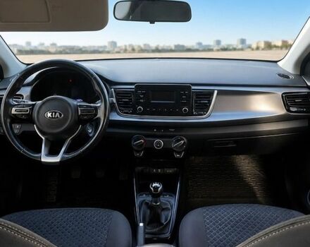 Білий Кіа Ріо, об'ємом двигуна 1.25 л та пробігом 69 тис. км за 9900 $, фото 3 на Automoto.ua