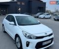 Білий Кіа Ріо, об'ємом двигуна 1.4 л та пробігом 89 тис. км за 13400 $, фото 16 на Automoto.ua