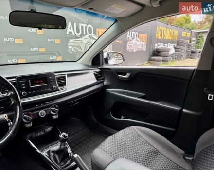 Білий Кіа Ріо, об'ємом двигуна 1.25 л та пробігом 69 тис. км за 9900 $, фото 9 на Automoto.ua