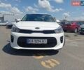 Білий Кіа Ріо, об'ємом двигуна 1.37 л та пробігом 90 тис. км за 12950 $, фото 6 на Automoto.ua