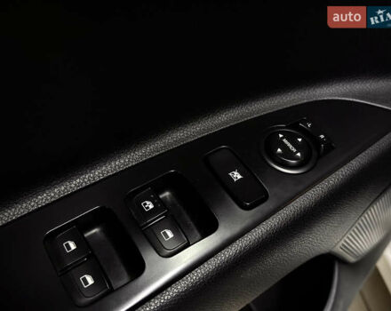 Білий Кіа Ріо, об'ємом двигуна 1.4 л та пробігом 65 тис. км за 12499 $, фото 26 на Automoto.ua