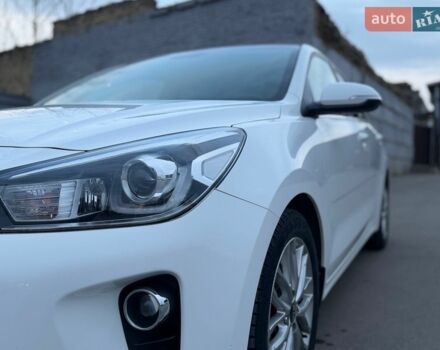 Білий Кіа Ріо, об'ємом двигуна 1.4 л та пробігом 89 тис. км за 13400 $, фото 13 на Automoto.ua
