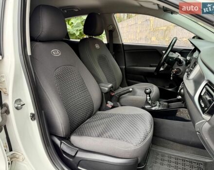 Білий Кіа Ріо, об'ємом двигуна 1.25 л та пробігом 69 тис. км за 9900 $, фото 8 на Automoto.ua