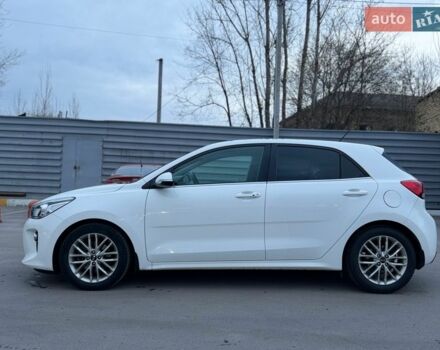 Білий Кіа Ріо, об'ємом двигуна 1.4 л та пробігом 89 тис. км за 13400 $, фото 10 на Automoto.ua