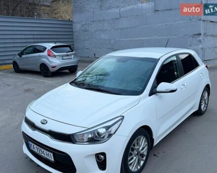 Білий Кіа Ріо, об'ємом двигуна 1.4 л та пробігом 89 тис. км за 13400 $, фото 11 на Automoto.ua