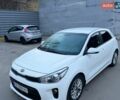 Білий Кіа Ріо, об'ємом двигуна 1.4 л та пробігом 89 тис. км за 13400 $, фото 11 на Automoto.ua