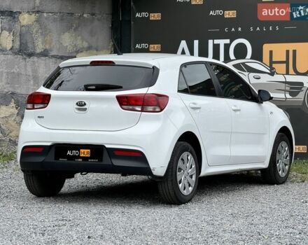 Білий Кіа Ріо, об'ємом двигуна 1.25 л та пробігом 69 тис. км за 9900 $, фото 5 на Automoto.ua