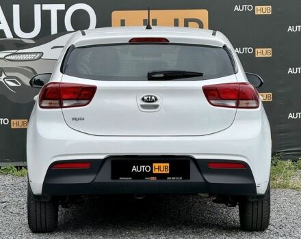 Білий Кіа Ріо, об'ємом двигуна 1.25 л та пробігом 69 тис. км за 9900 $, фото 4 на Automoto.ua