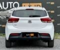 Білий Кіа Ріо, об'ємом двигуна 1.25 л та пробігом 69 тис. км за 9900 $, фото 4 на Automoto.ua