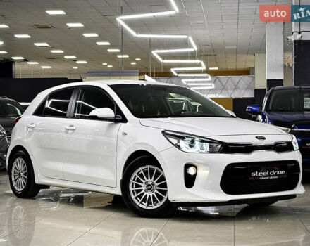 Білий Кіа Ріо, об'ємом двигуна 1.4 л та пробігом 65 тис. км за 12499 $, фото 8 на Automoto.ua