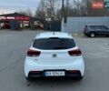 Білий Кіа Ріо, об'ємом двигуна 1.4 л та пробігом 89 тис. км за 13400 $, фото 4 на Automoto.ua