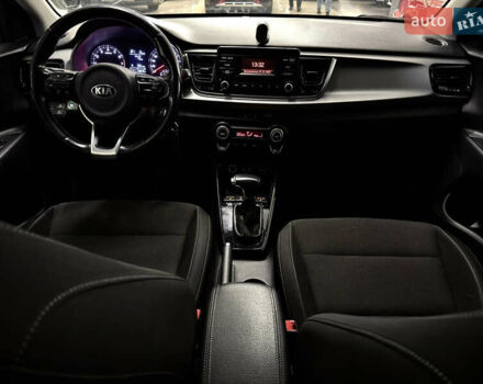 Білий Кіа Ріо, об'ємом двигуна 1.4 л та пробігом 65 тис. км за 12499 $, фото 15 на Automoto.ua