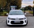 Білий Кіа Ріо, об'ємом двигуна 1.2 л та пробігом 91 тис. км за 8424 $, фото 1 на Automoto.ua