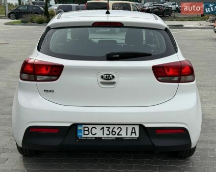 Білий Кіа Ріо, об'ємом двигуна 1.25 л та пробігом 64 тис. км за 11000 $, фото 4 на Automoto.ua