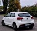 Білий Кіа Ріо, об'ємом двигуна 1.2 л та пробігом 91 тис. км за 8424 $, фото 3 на Automoto.ua