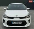 Білий Кіа Ріо, об'ємом двигуна 1.25 л та пробігом 64 тис. км за 11000 $, фото 1 на Automoto.ua