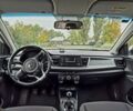 Білий Кіа Ріо, об'ємом двигуна 1.2 л та пробігом 91 тис. км за 8424 $, фото 10 на Automoto.ua