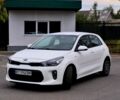 Білий Кіа Ріо, об'ємом двигуна 1.2 л та пробігом 91 тис. км за 8424 $, фото 2 на Automoto.ua