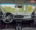 Білий Кіа Ріо, об'ємом двигуна 1.25 л та пробігом 91 тис. км за 8500 $, фото 8 на Automoto.ua