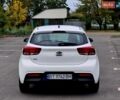 Білий Кіа Ріо, об'ємом двигуна 1.25 л та пробігом 91 тис. км за 8500 $, фото 4 на Automoto.ua