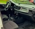 Білий Кіа Ріо, об'ємом двигуна 1.25 л та пробігом 91 тис. км за 8500 $, фото 6 на Automoto.ua