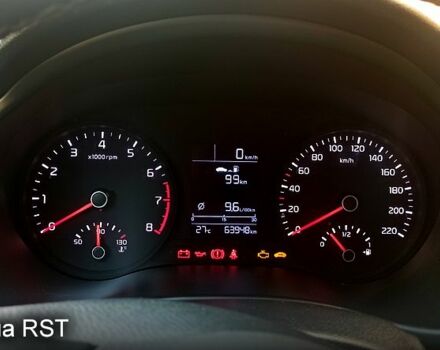 Білий Кіа Ріо, об'ємом двигуна 1.2 л та пробігом 64 тис. км за 13250 $, фото 6 на Automoto.ua