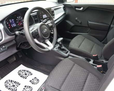 Білий Кіа Ріо, об'ємом двигуна 1.6 л та пробігом 29 тис. км за 12499 $, фото 19 на Automoto.ua
