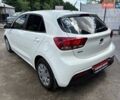 Білий Кіа Ріо, об'ємом двигуна 1.25 л та пробігом 73 тис. км за 10700 $, фото 7 на Automoto.ua