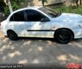 Белый Киа Рио, объемом двигателя 1.3 л и пробегом 290 тыс. км за 2400 $, фото 4 на Automoto.ua