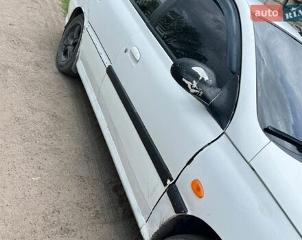 Білий Кіа Ріо, об'ємом двигуна 1.4 л та пробігом 300 тис. км за 1700 $, фото 2 на Automoto.ua