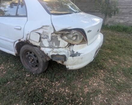 Білий Кіа Ріо, об'ємом двигуна 1.3 л та пробігом 354 тис. км за 400 $, фото 8 на Automoto.ua