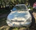 Белый Киа Рио, объемом двигателя 1.3 л и пробегом 354 тыс. км за 703 $, фото 1 на Automoto.ua